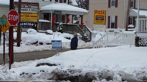 An Amish man walks in downtown Volant. 